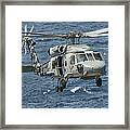 A Us Navy Sh-60f Seahawk Flying Framed Print