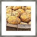 Freshly Harvested Potatoes In A Wooden Bucket Framed Print