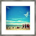 Lifeguards See Something In The Water Framed Print