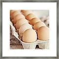 One Dozen Eggs Framed Print