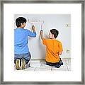 Paintwork - Mother And Son Painting Wall Together Framed Print