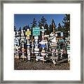 Sign Posts Forest In Watson Lake Yukon Framed Print