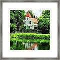 Suburban House With Reflection Framed Print