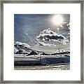 Sun, Clouds And Snow Framed Print