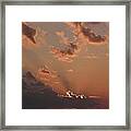 Sunrise In The Clouds Framed Print