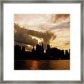 The New York City Skyline At Sunset Framed Print