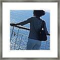Woman Looking Out To Sea From Deck Of Boat Framed Print