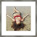Woman On Sand Framed Print