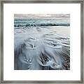 Pebbles In The Beach And Flowing Sea Water Framed Print