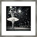 A Beautiful Ballerina Dancing In Studio Framed Print
