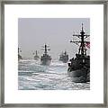 A Fleet Of Ships In Formation At Sea Framed Print