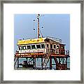 A Rusty Colorful Shipwreck Projects Out Of The Water Of The Indian Ocean At The Coast Of Sri Lanka Framed Print