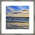 A Surfer Heads Home Under A Cloudy Sunset At Crystal Pier Framed Print