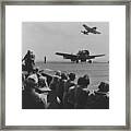 A Us Navy Hellcat Fighter Aircraft Landing On The Deck Of A Carrier Framed Print