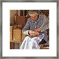 A Woman Weaving A Basket In Castelsardo Framed Print