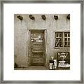 Adobe With Chair Framed Print