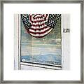 American Flag  Banner In A Store Front Framed Print