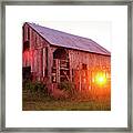 An Old Barn Glow Framed Print