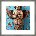 Angel On Blue Wooden Wall Framed Print