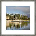 Angler Amidst Gorgeous Surroundings And A Calm River In The Yellowstone In Wyoming Framed Print
