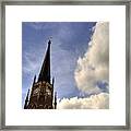 Assumption Clouds Framed Print