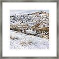 Badlands In Snow Framed Print