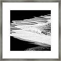 Black Beach And The Water Of The Ocean Framed Print