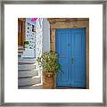 Blue Door And Stairs Framed Print