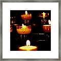 Burning Candles In A Church Framed Print