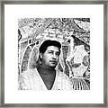 Cesar Chavez Stands In Front Of The Framed Print