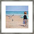 Chasing Birds On The Beach Framed Print