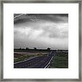 Chasing The Storm - Bw And Color Framed Print