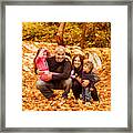 Cheerful Family In Autumn Woods Framed Print
