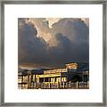 Clouds Over Pier House Framed Print