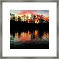A Frozen Lake Relect The Bold Setting Sun Colors Framed Print