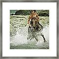 Cowboy Riding Horse Across The River Framed Print