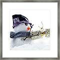 Cute Snowman Pulling A Cracker Framed Print