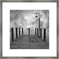 Dock And Clouds Framed Print