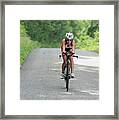 Eleonore Cycling Along Road Coasting Framed Print