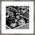 Glass Bottles In The Garden Framed Print