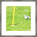 Golf Ball And Club Before Hitting Close Up. Framed Print