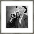 Happy Old Man Drinking Glass Of Beer Framed Print