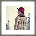 Historical Woman In An Overcoat And Red Hat Framed Print