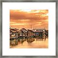 Huts On Water Framed Print