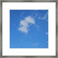 In The Clouds Framed Print