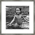 Kid Taking A Swim In The River Framed Print
