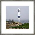 Lamppost Near The Sea. Framed Print