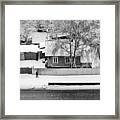 Lone Walker And The Snow Fall Village Framed Print