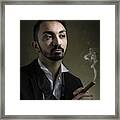 Man Smoking A Cigar Framed Print