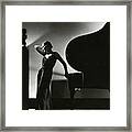 Margaret Horan Posing Beside A Piano Framed Print